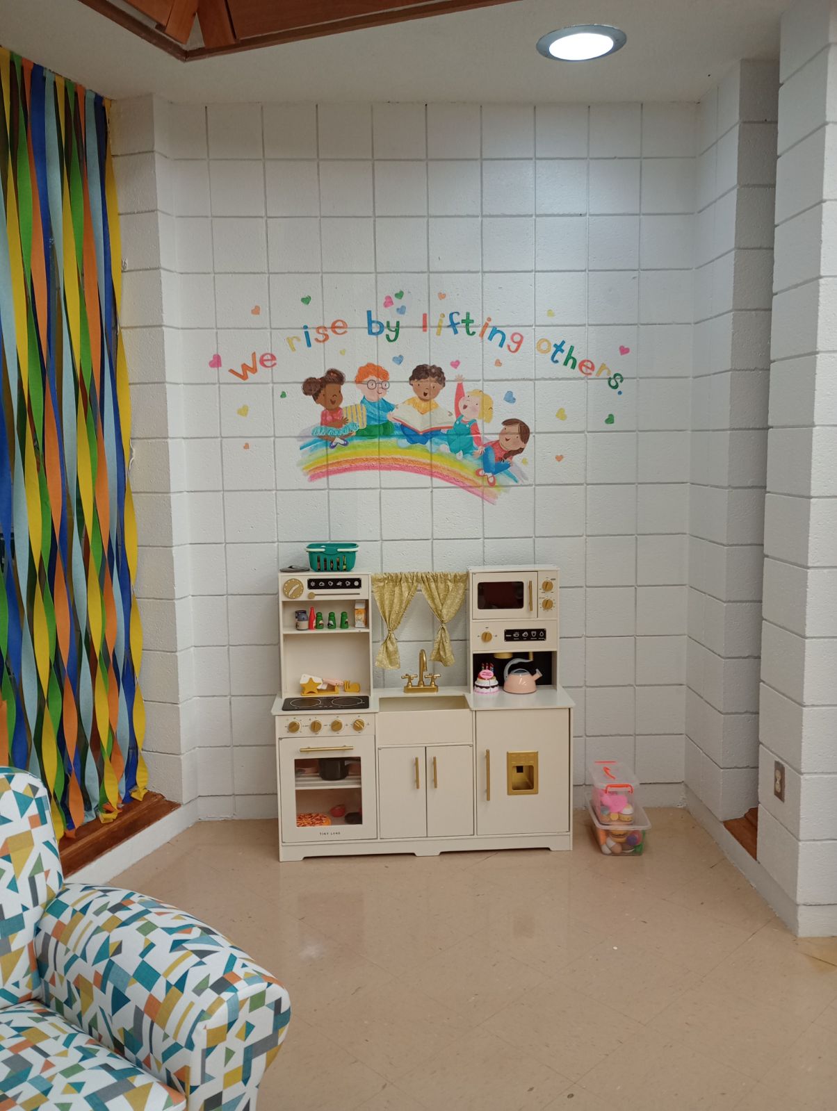 Play Kitchen with wall decor.JPG
